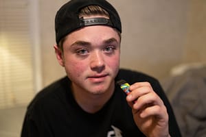 Teen thinking about effects of vaping on teens