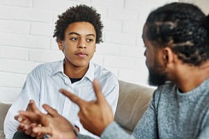 A father and son dealing with school refusal