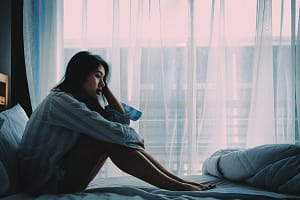 substance abuse and anxiety take turns negatively impacting the mental and physical health of a young woman who cannot get out of bed