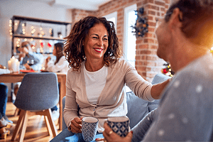 a woman happily enjoys the holidays in sobriety