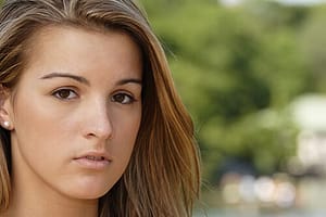 Young girls blank face on way to drug abuse recovery