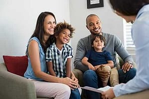 Smiling family knows how family counseling in Maryland helped their addiction issues