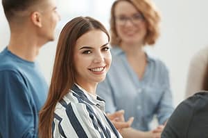 Smiling young woman looking for northeast Florida drug rehab centers