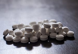pile of pills requiring detox from opiates