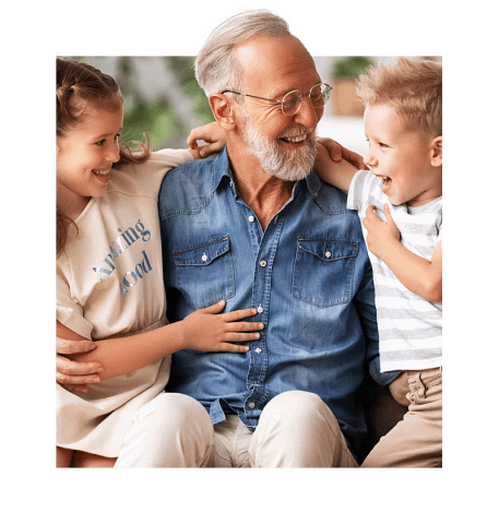 Senior smiling holding grandchildren