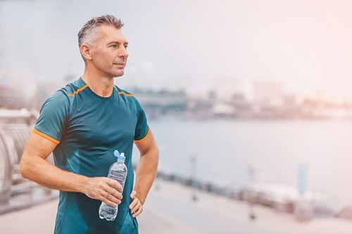 man out exercising after drug detox