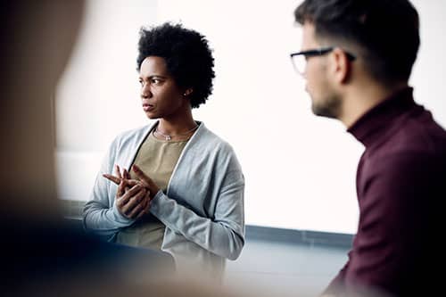 woman in group therapy for alcohol rehab in Atlanta