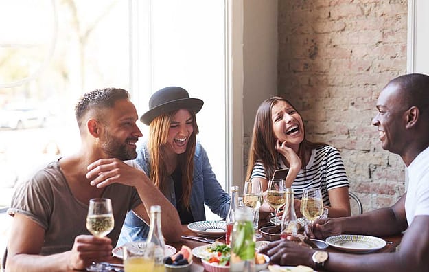 a group of friends getting brunch and casual drinking