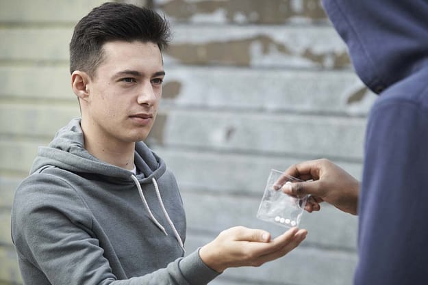 teen buying drugs needing Teenage Drug Addiction Treatment