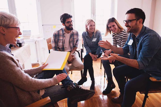 group discusses addiction triggers