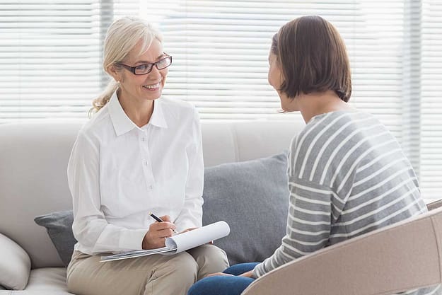 women discuss wellness education