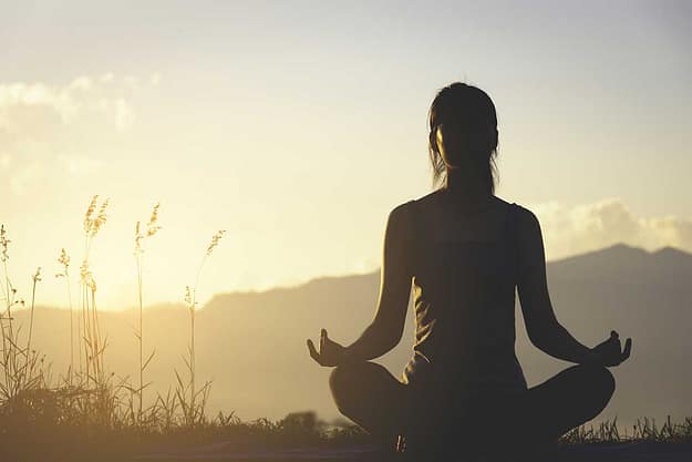 woman participates in meditation therapy