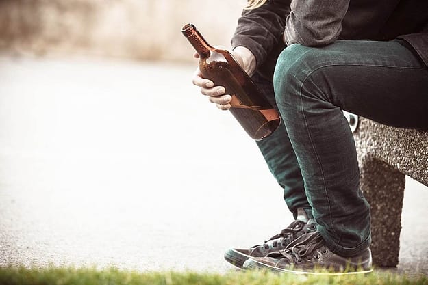 Man holding bottles wonders what is self medication