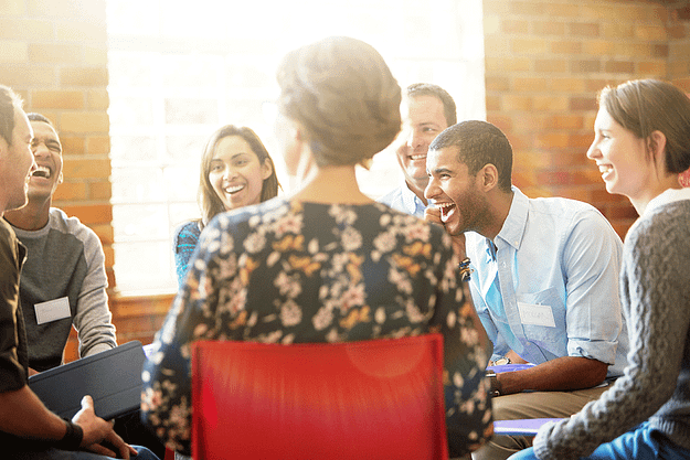 A group of people discussing the question, "What is rehab like?"