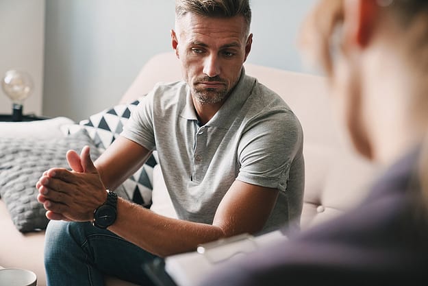 middle-aged man deep in thought during Drug Addiction Therapy