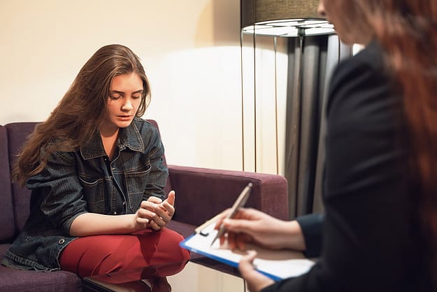 young woman asking about programs outside of Philadelphia Heroin Rehab Program