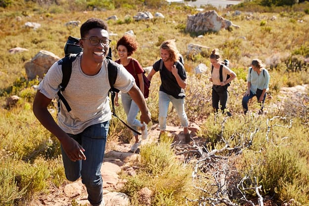 group going on hike to stay sober