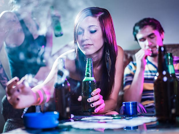 teen drug and alcohol addiction happening as adolescents drink and smoke