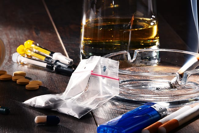 a pile of drug showing dangers of mixing substances