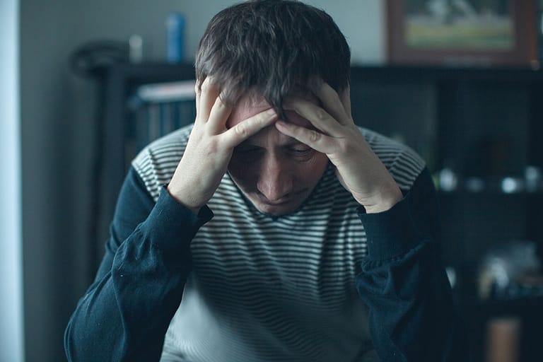 Man thinking to himself "Drugs Ruined My Life"