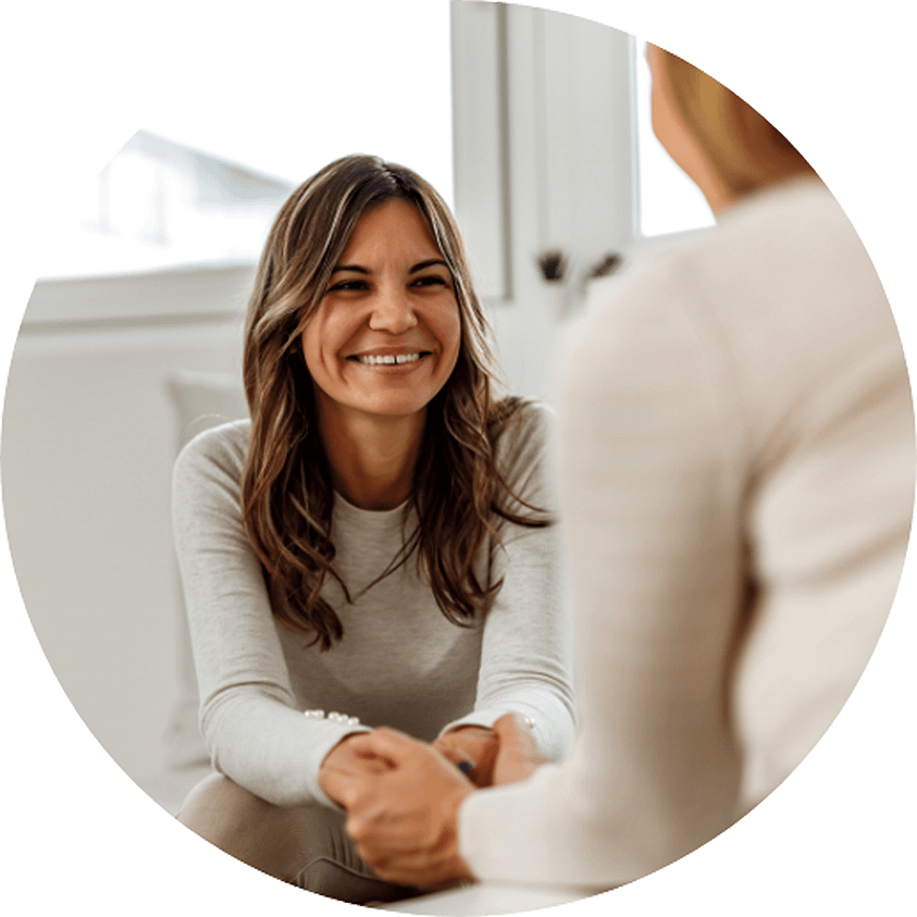 woman smiles while receiving anxiety disorder treatment at tru wellness center