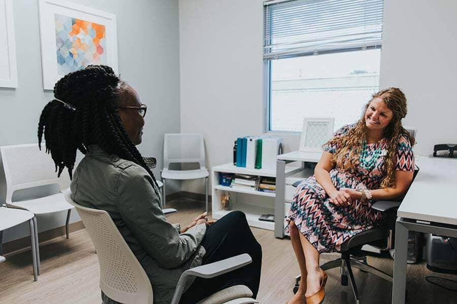 Medical professional providing counseling to a drug rehab patient