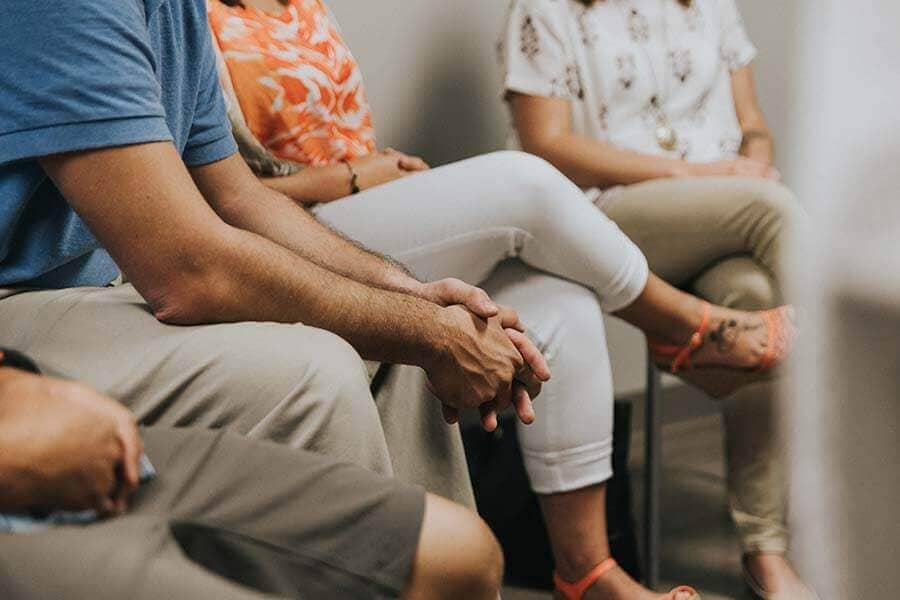 Patients sitting in a drug rehab group therapy session