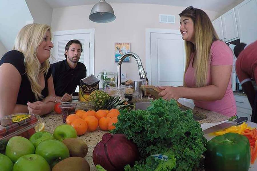 PHP Patients working together to prepare dinner in a drug rehab house