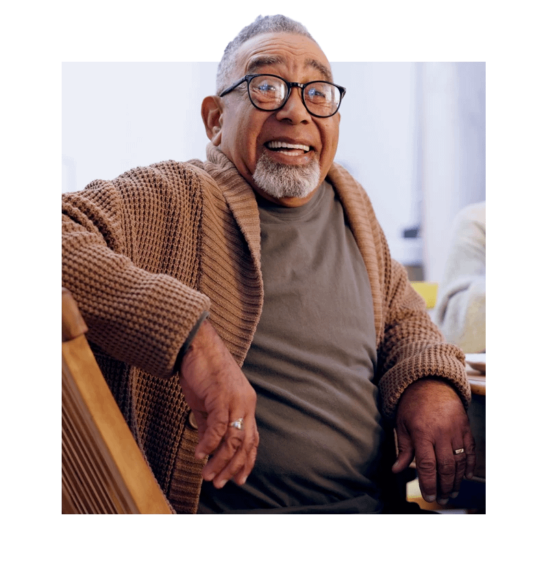 Senior in glasses smiling