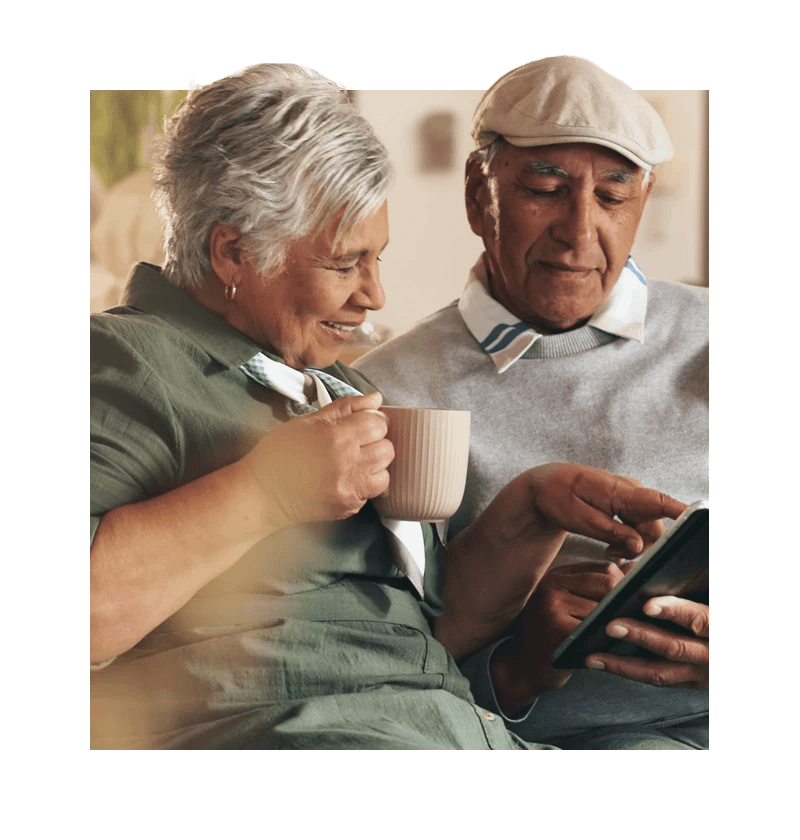 Seniors looking at tablet