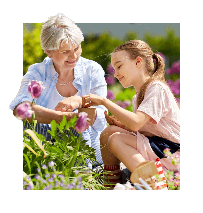 Senior gardening with grandchild