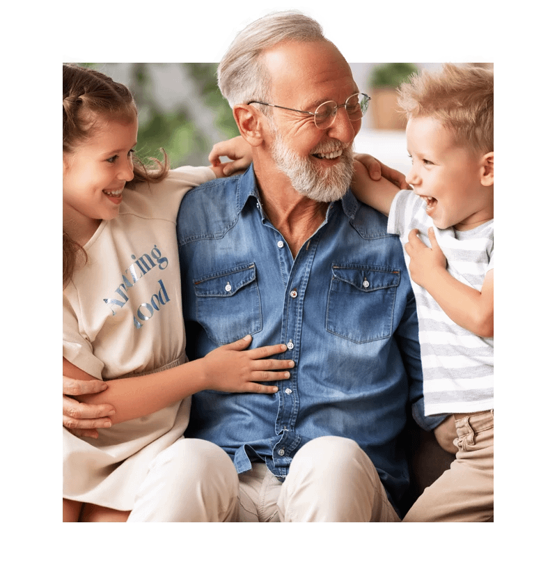 Senior smiling holding grandchildren